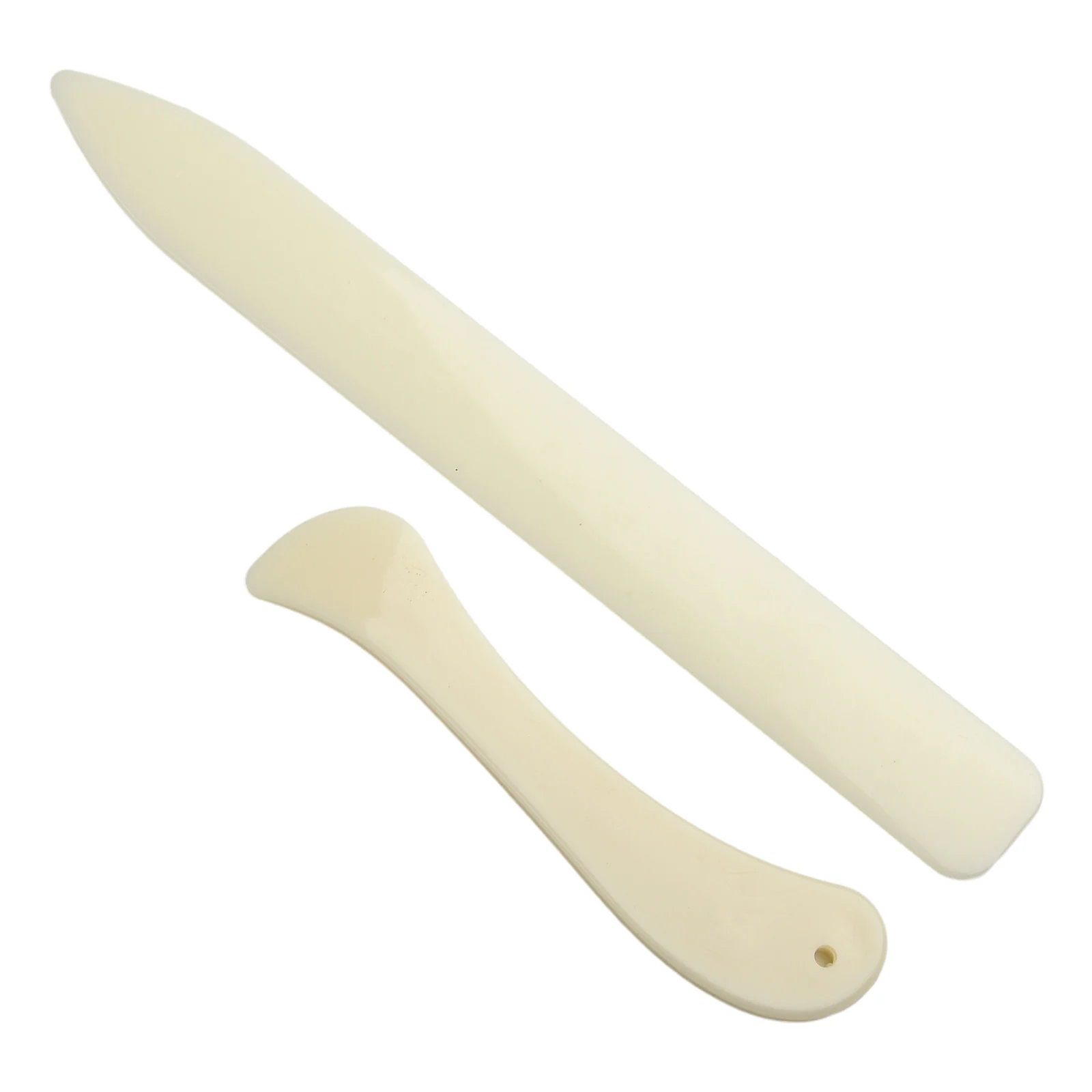 قطعتان من أدوات العمل بالجلد،  - مراجعة Bone Folder Tool وسعره